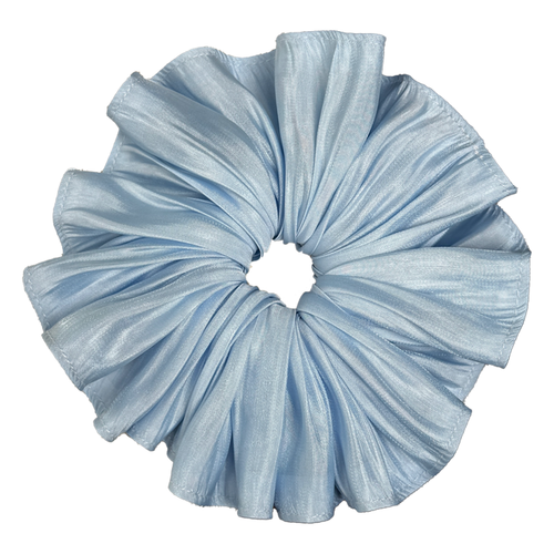 Single soft blue pleated satin scrunchie isolated on white background. Accordion pleats radiate from the center with luminous silvery highlights across the folds.