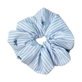 Front view of a blue striped bow scrunchie on white background, classic nautical stripes and bow detail.