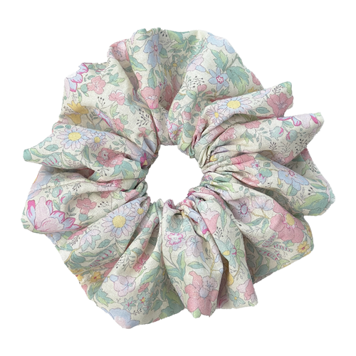 Front view of a vibrant dopamine floral scrunchie on white background, no-crease hair protection in multi-color.